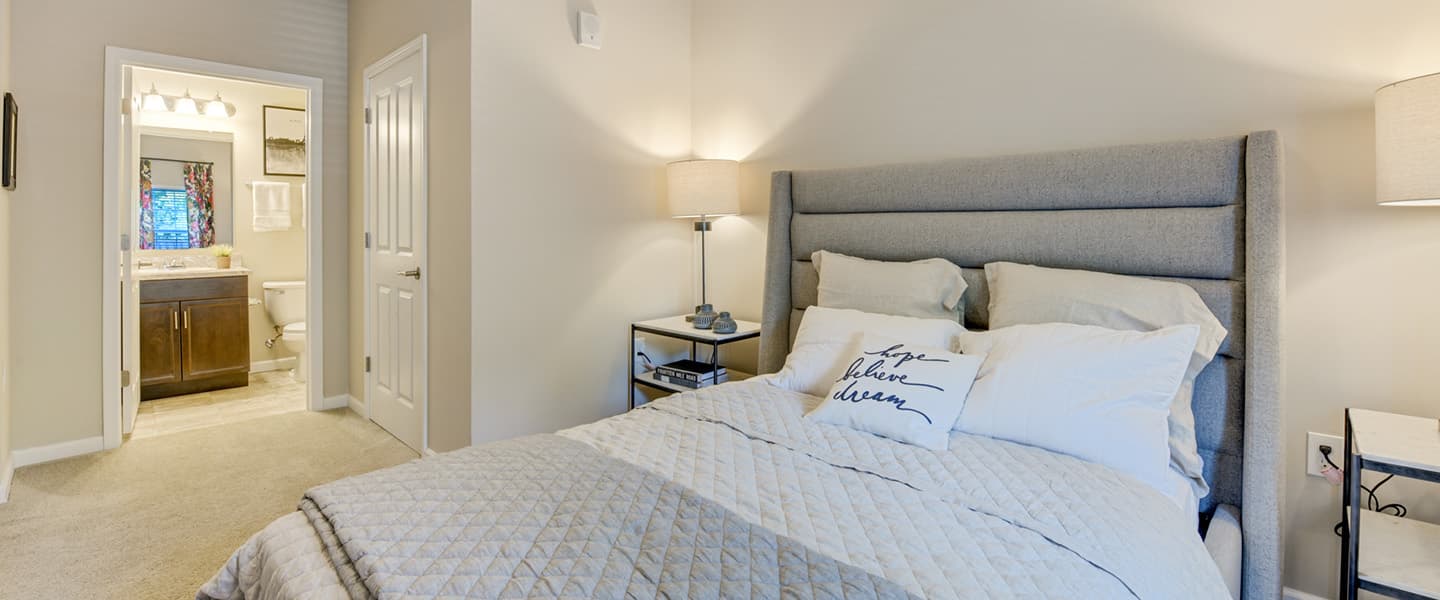 Bedroom with ensuite bathroom offering comfort and convenience