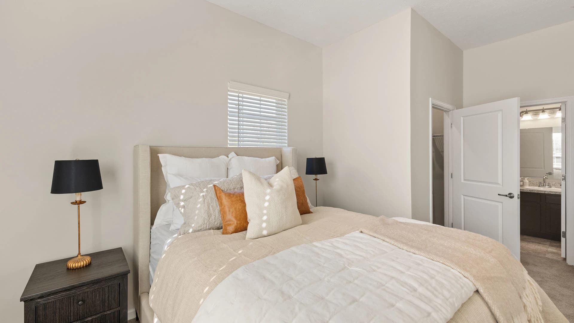 Large bedroom space with walk in closet and private bathroom in a Grove City apartment unit