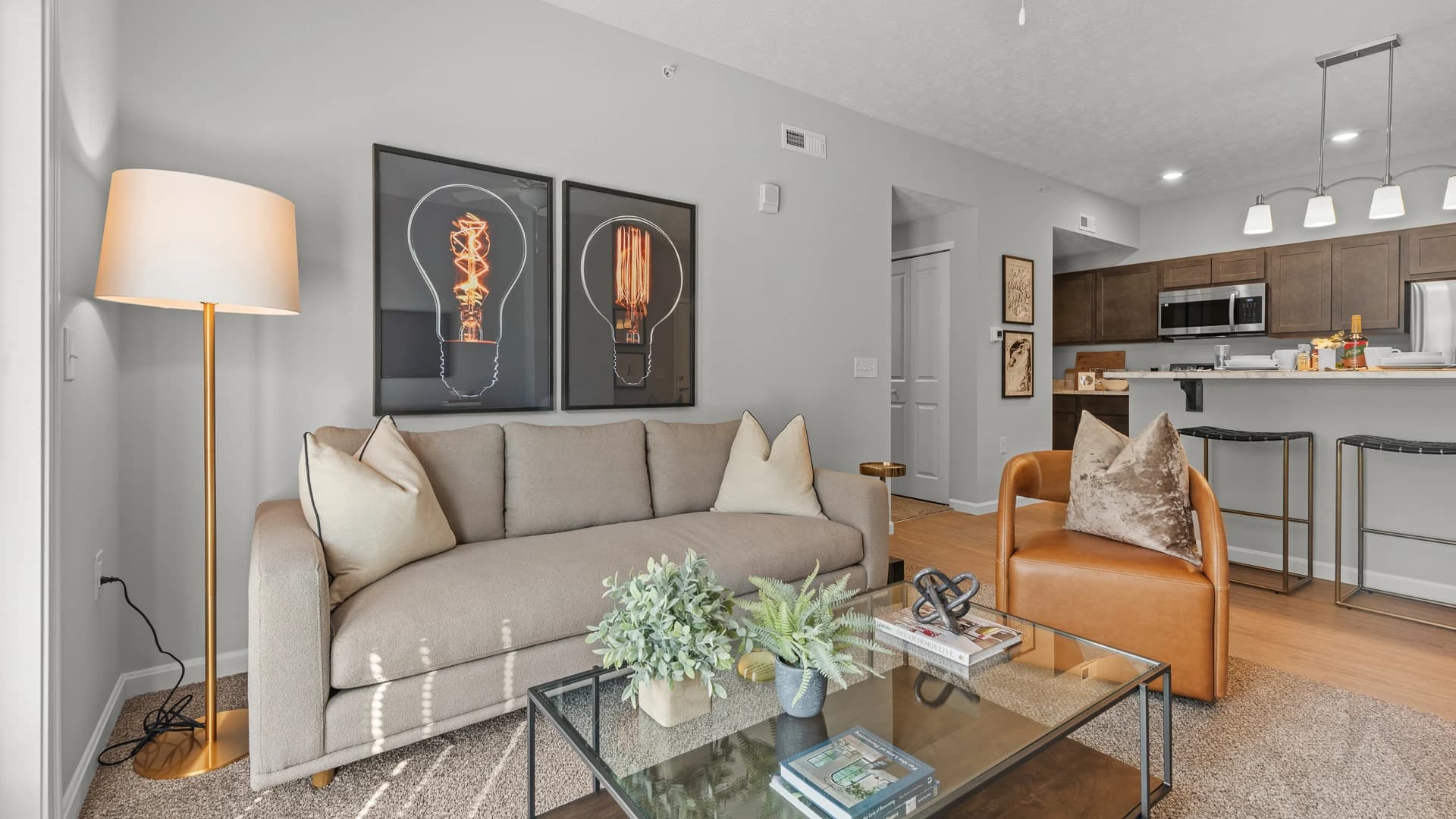 Open floor plan with connected living room and kitchen area of an Etna Ohio apartment