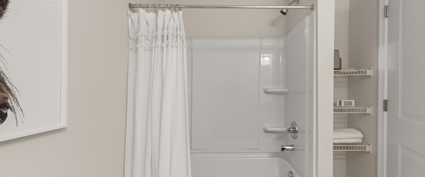 Shower, tub and storage in a Powell Ohio apartment