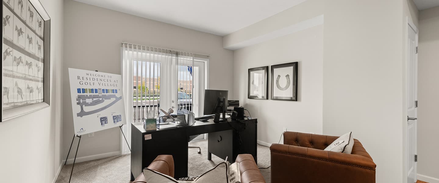 Office set up with desk, chairs and a computer in a Powell Ohio apartment unit