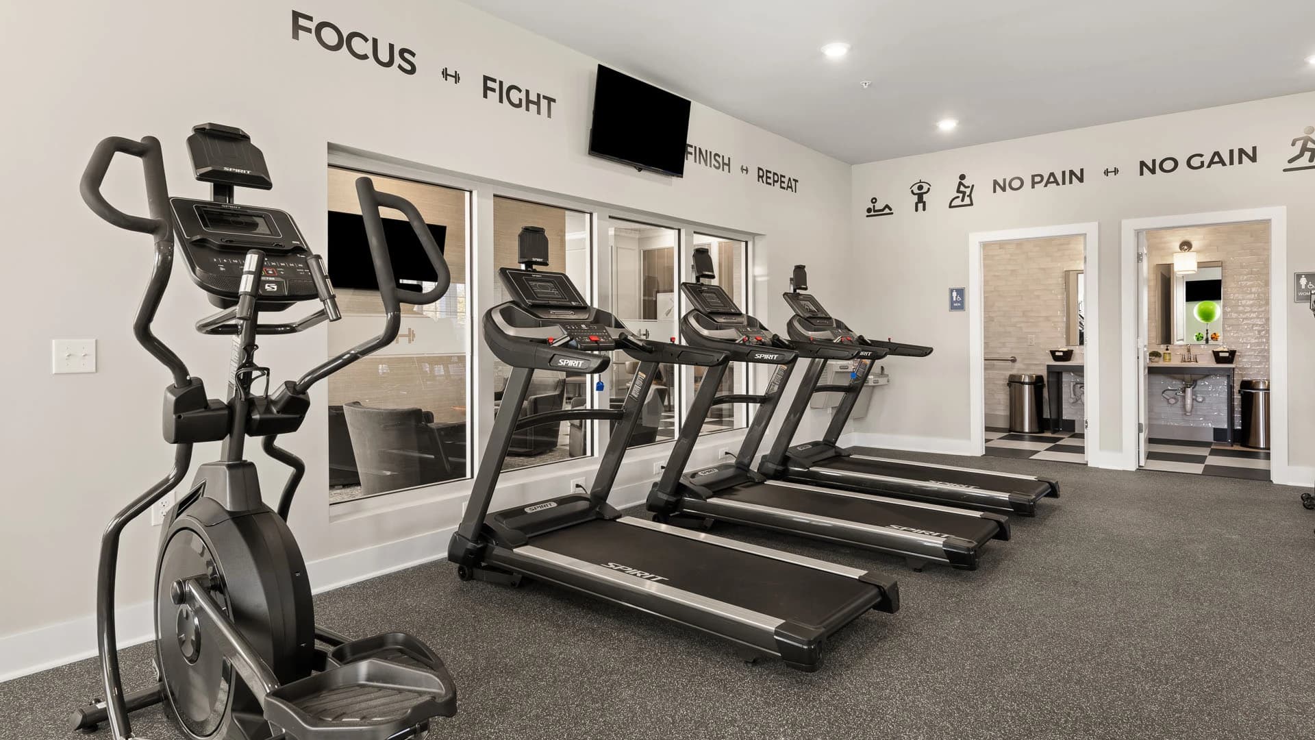Stationary bikes and treadmills in a fitness center for use by residents of a Grove City Ohio apartment community
