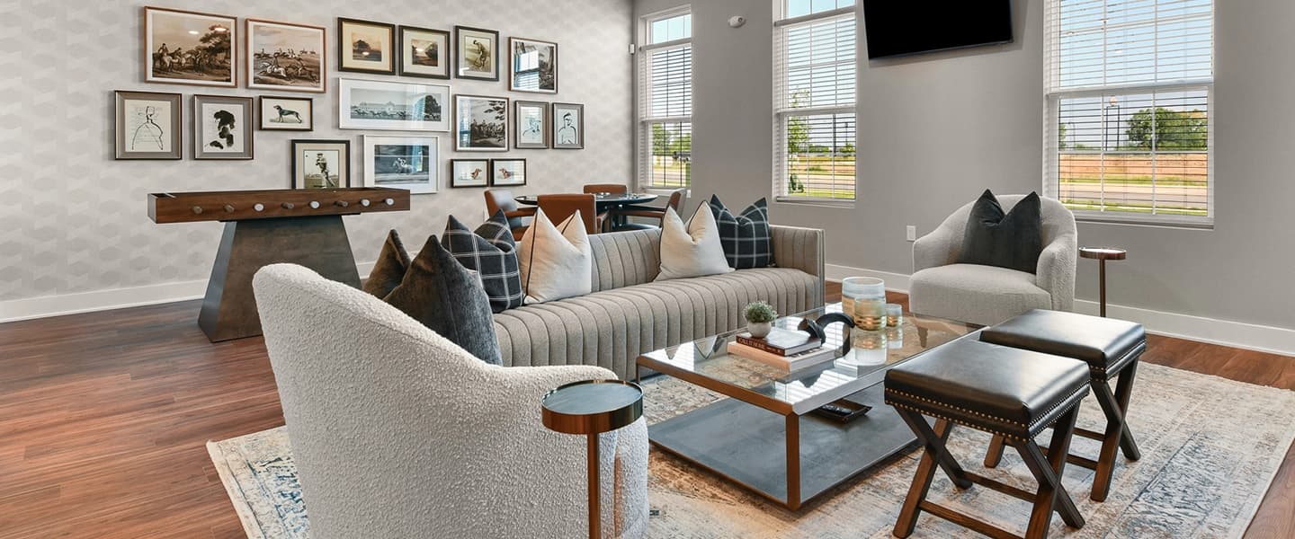 Resident lounge featuring cozy seating and a welcoming atmosphere