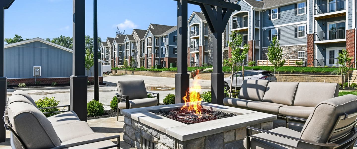 Outdoor lounge space with a firepit