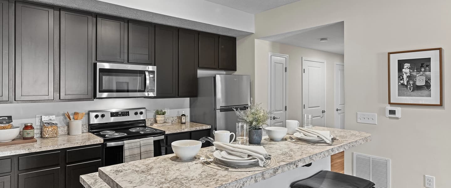 Kitchen with island and stainless steel appliances offering a modern layout